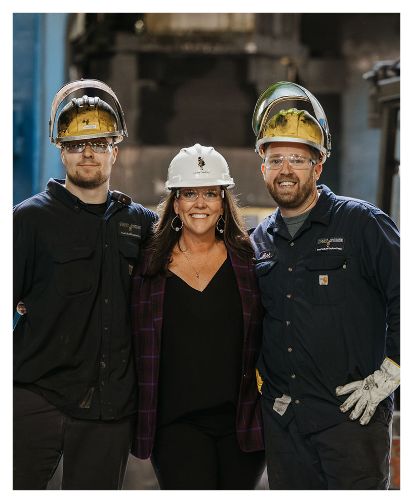 Workers in uniform wearing hard hats.jpg